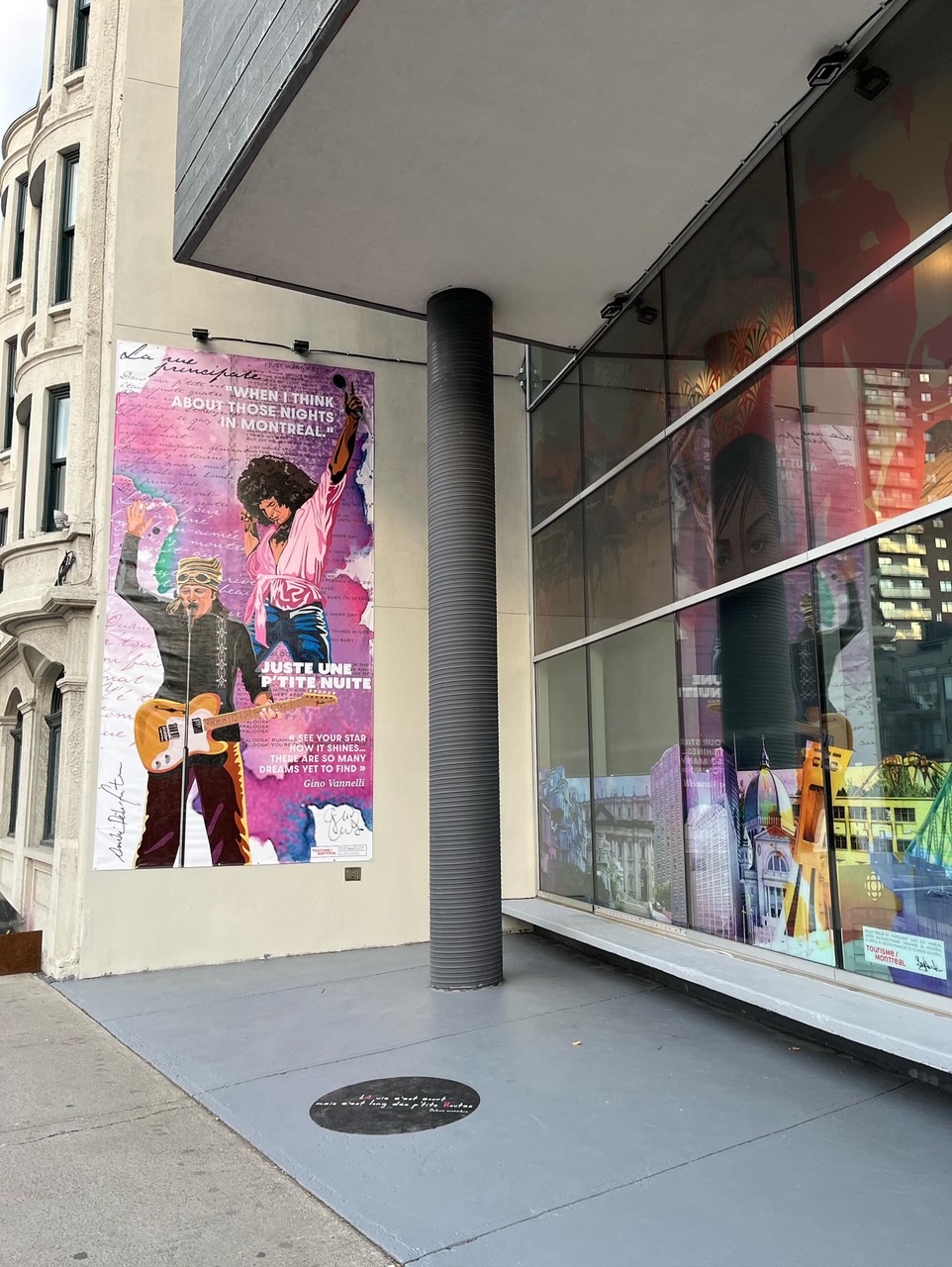 a poster on the wall of a building